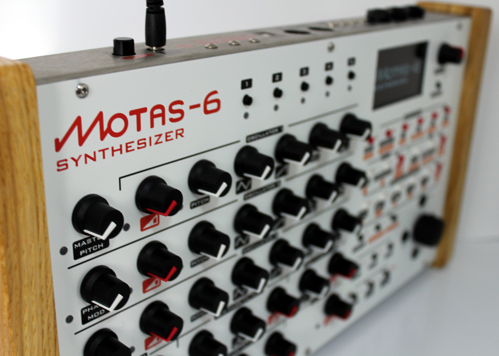 motas-6 synth with white panel finish