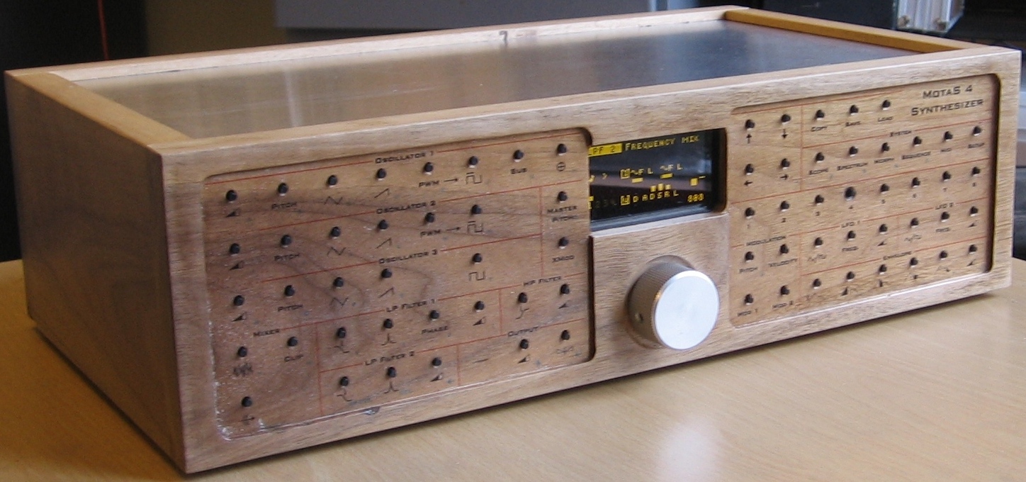 Motas4 analogue synthesizer in a walnut wood finish