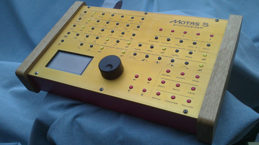 Motas4 analogue synthesizer in a walnut wood finish